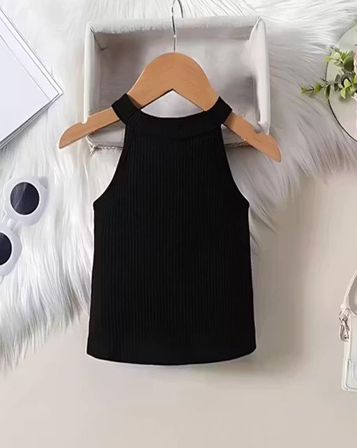 Stylish sleeveless black top paired with a light beige skirt perfect for a summer outing or casual brunch - Image 4